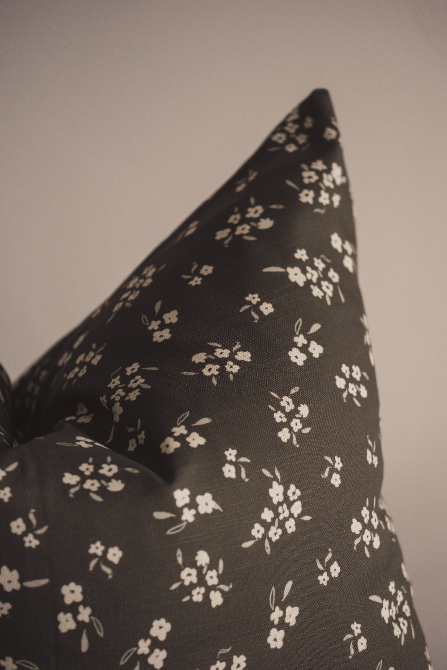 A close up of the Wild petal Cushion by Lil & Dot.